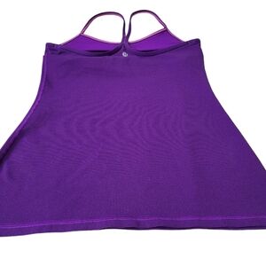 Lululemon woman's size 6 with pink  accents on upper straps.